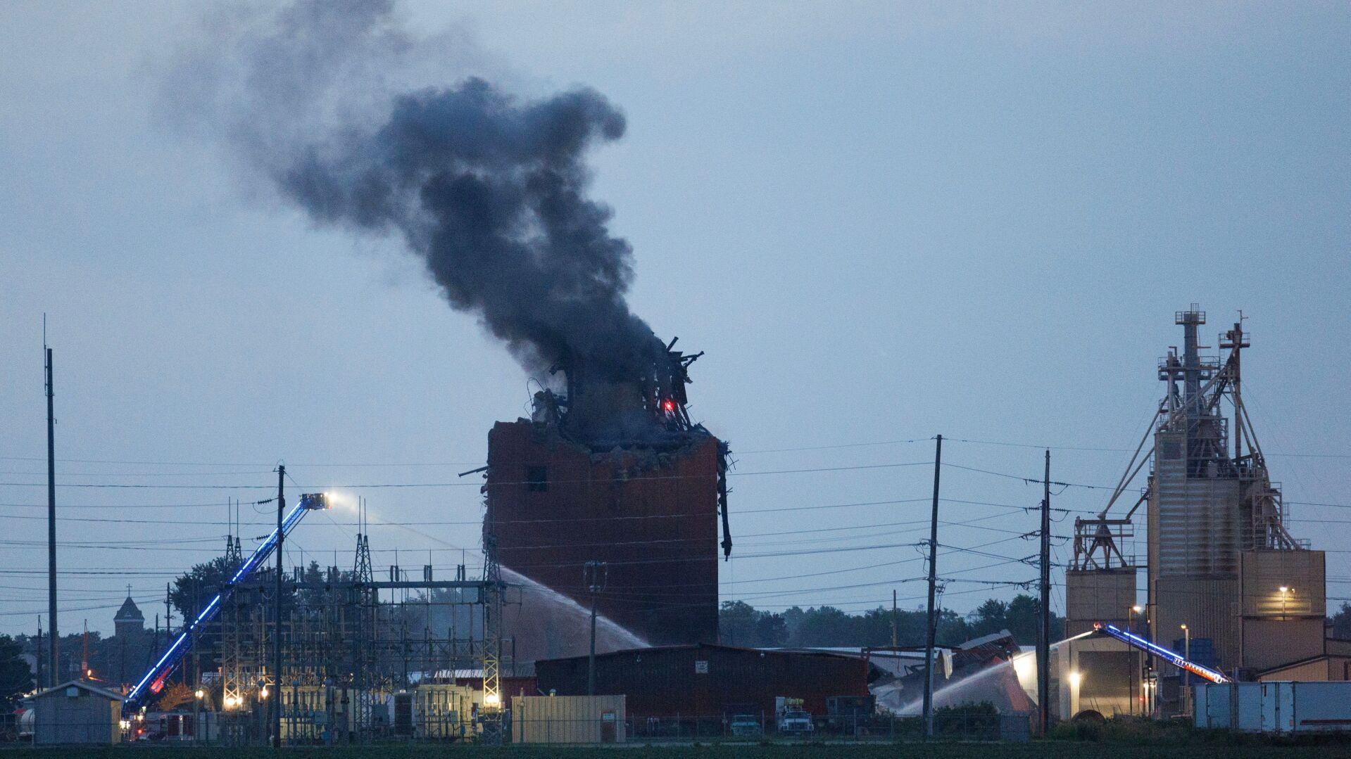 Smoke rises from Horizon Biofuels as crews continue to extinguish fire after explosion in Fremont